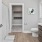 a bathroom with a toilet and a sink