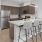 a kitchen with a table and chairs